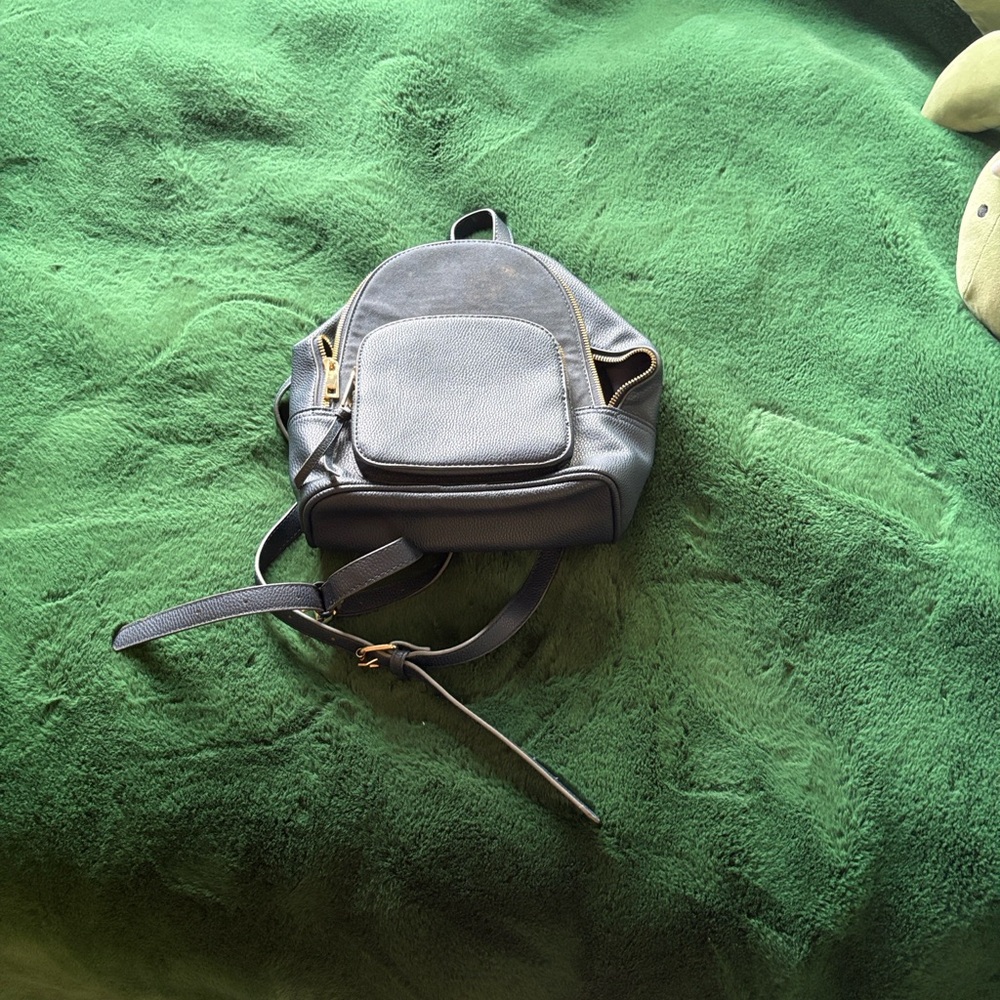 Navy Leather Backpack with Gold Accents